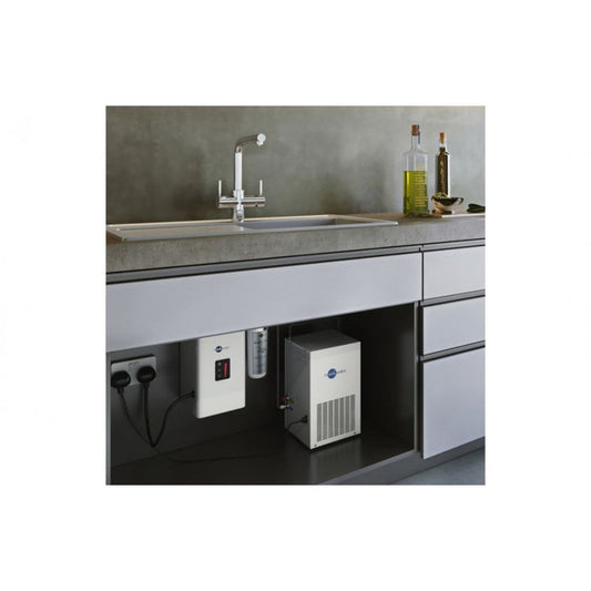 InSinkErator NeoChiller Cold Water Chiller Tank installed in a kitchen.