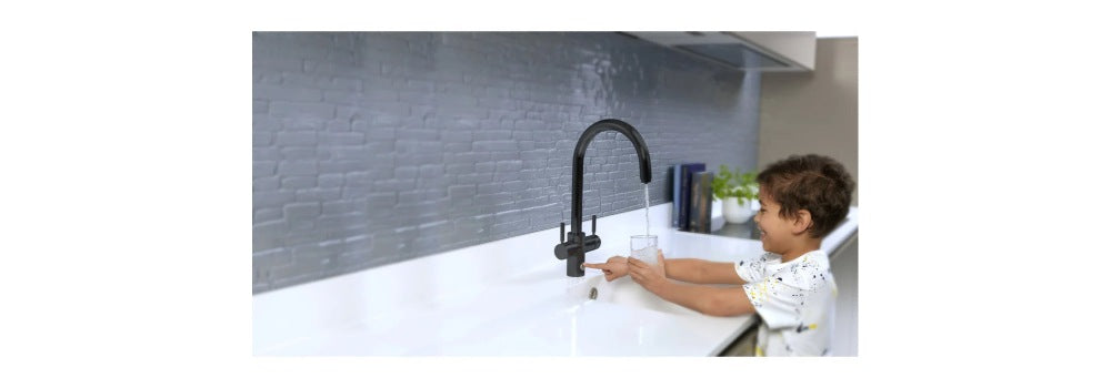 InSinkerator Hot Tap with child using