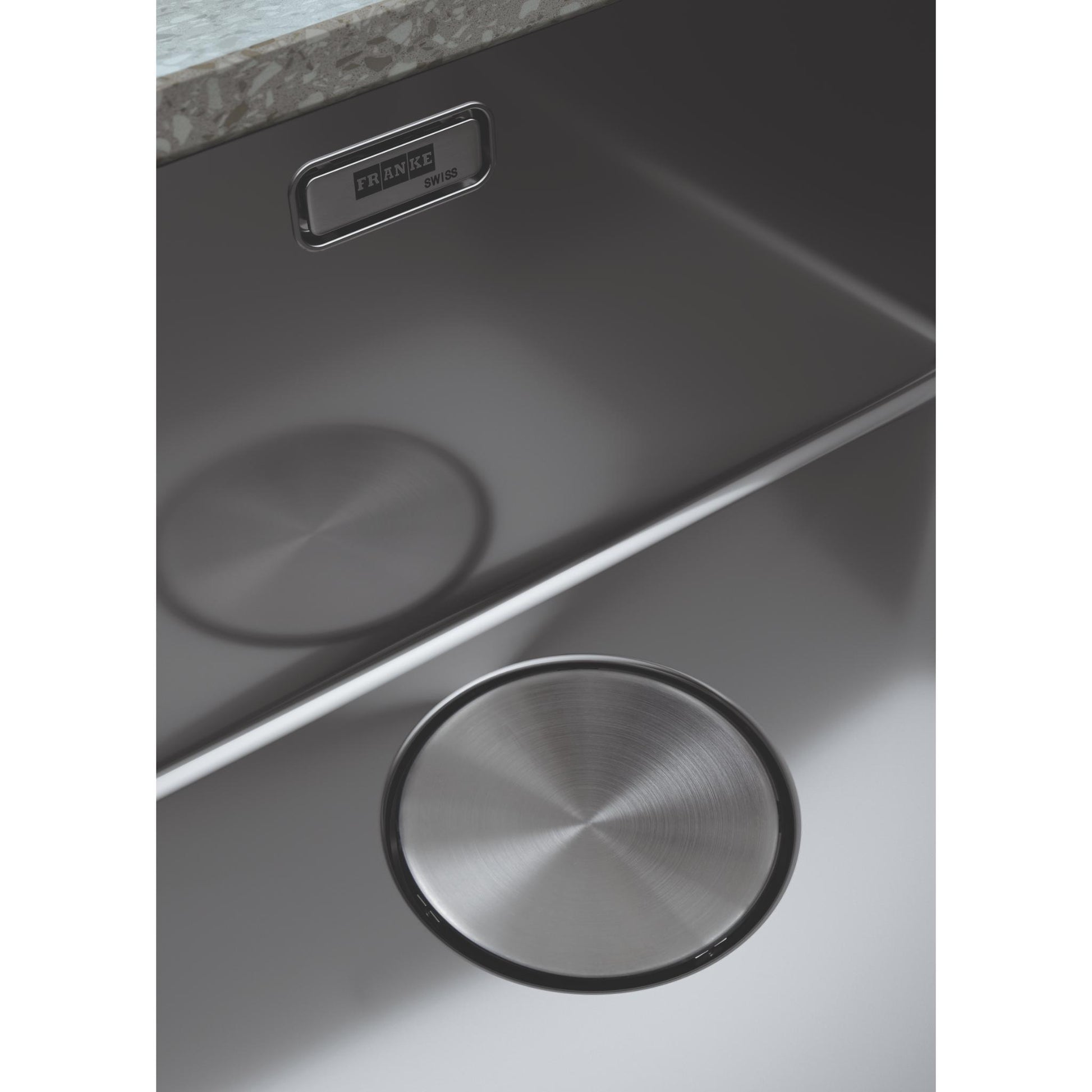 Franke Mythos Undermount  Stainless Steel Sink close up view of finish and plug