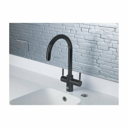 InSinkErator 4N1 Touch Hot Water tap installed with white marble countertops.