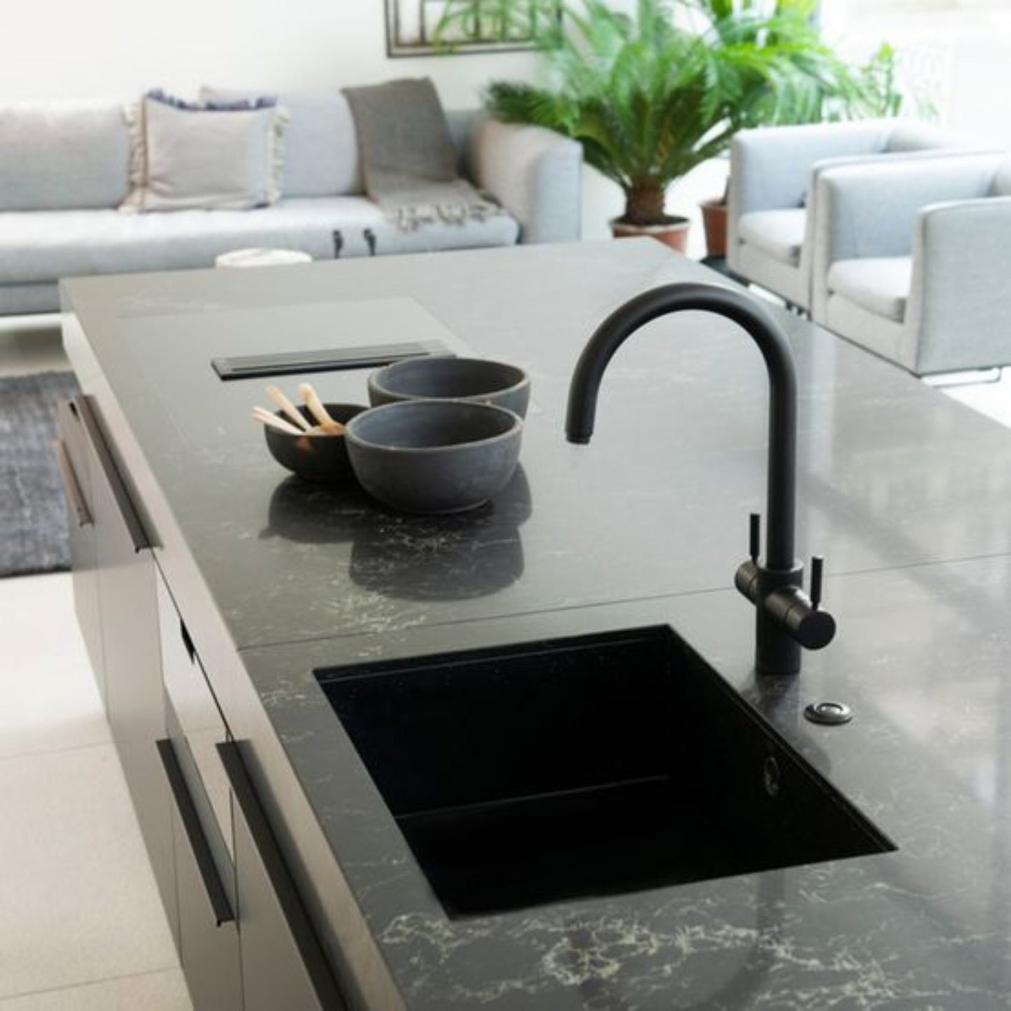InSinkErator 3N1 J Spout Tap (Velvet Black) lifestyle shot in kitchen with marble worktop black
