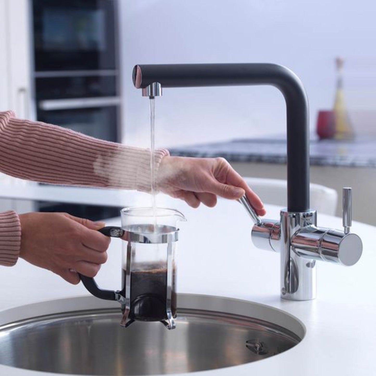 InSinkErator 3 in 1 Steaming Hot Water Kitchen Tap (Tap Only) Jet Black lifestyle image- The Tap Specialist